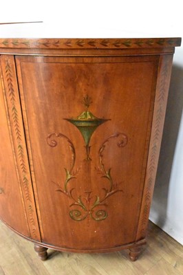 Lot 1508 - Pair of George III style satinwood and polychrome painted bowfront commodes