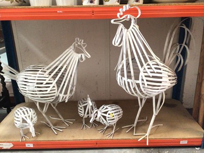 Lot 360 - Painted metal work cockerel, hen and three chicks, together with two large wooden forks