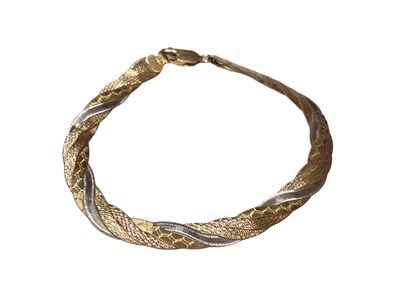 Lot 187 - Three-colour 18ct gold bracelet with plaited design, 19.5cm long