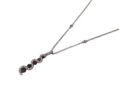 Lot 188 - Black and white diamond pendant necklace with five graduated black diamonds surrounded by white diamonds on 18ct white gold chain