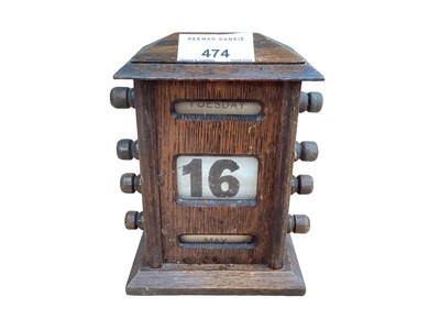 Lot 474 - Early 20th century oak perpetual desk calendar