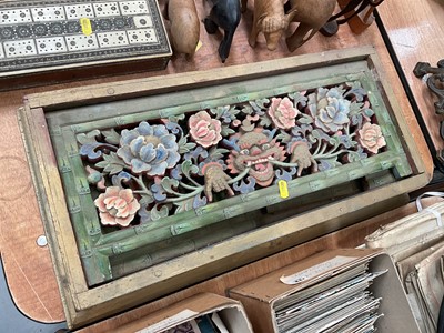 Lot 489 - Chinese carved wood book stand with pierced polychrome painted decoration.