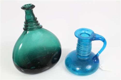 Lot 73 - Antique Persian green glass saddle flask of...