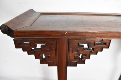 Lot 1517 - Antique Chinese hardwood altar table, the dished top with scrolled ends, raised on angular pierced brackets and square supports