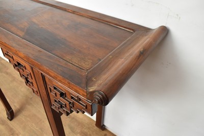 Lot 1517 - Antique Chinese hardwood altar table, the dished top with scrolled ends, raised on angular pierced brackets and square supports