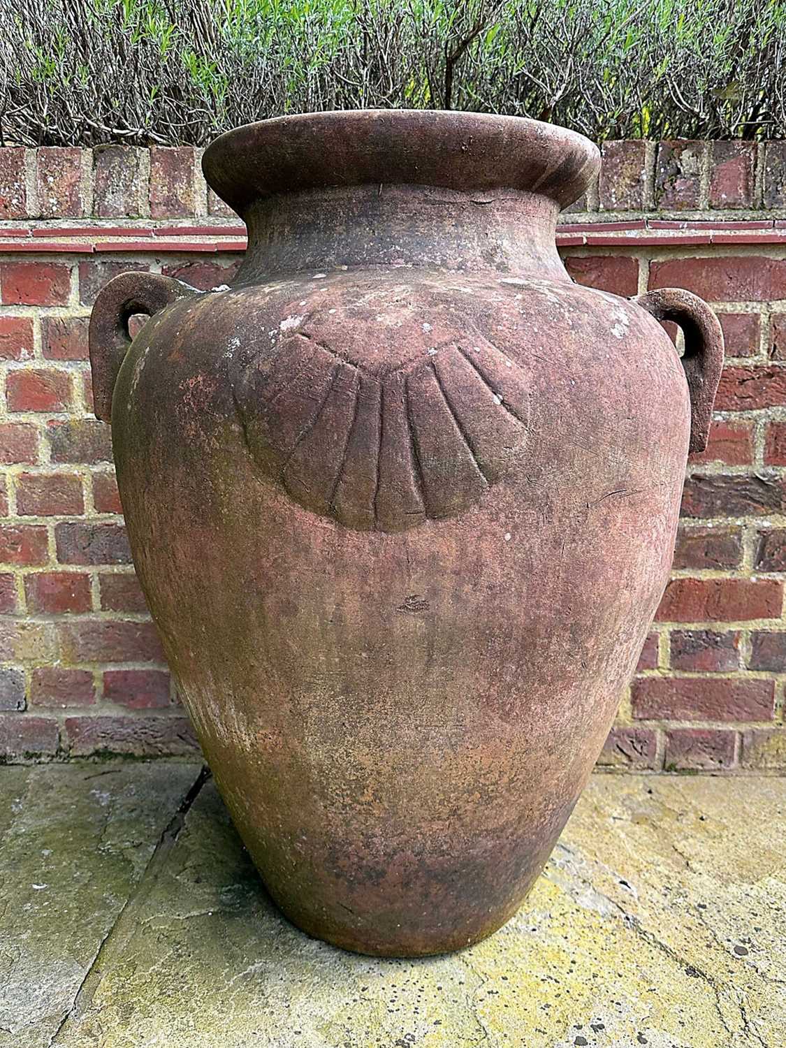 Lot 1496 - Set of four terracotta garden urns of Grecian form, 79cm high