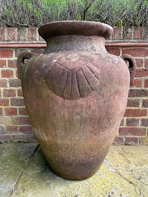 Lot 1496 - Set of four terracotta garden urns of Grecian form, 79cm high