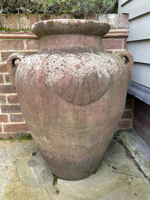 Lot 1496 - Set of four terracotta garden urns of Grecian form, 79cm high