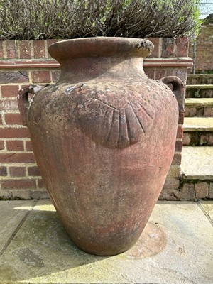 Lot 1496 - Set of four terracotta garden urns of Grecian form, 79cm high