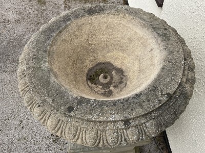 Lot 1550 - Large pair of reconstituted stone garden urms of campagna form with egg and dart rim, reeded bowl on socle bases with square plinths, 122cm high x 72cm diameter