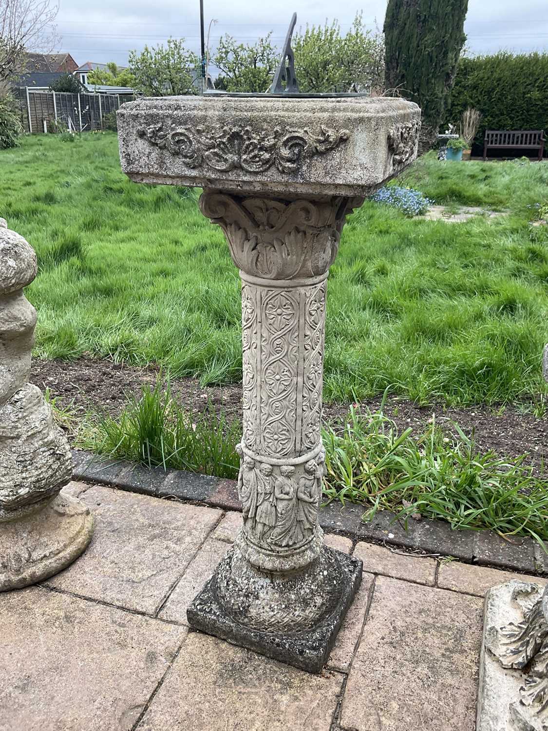 Lot 1553 - Brass sundial on a concrete pedestal base with weathered finish, 80cm high.
