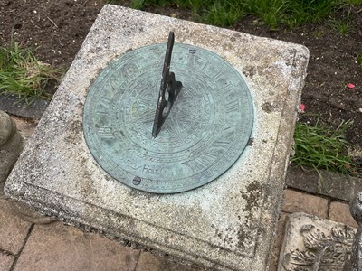 Lot 1553 - Brass sundial on a concrete pedestal base with weathered finish, 80cm high.