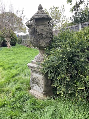 Lot 1557 - A fine antique reconstituted stone garden urn and cover on plinth, with detachable lid, female caryatid handles, floral festoons on socle base, the plinth with figures and acanthus leaves, approxim...