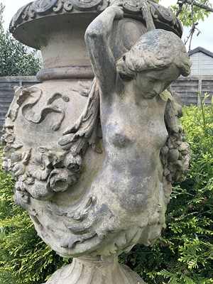 Lot 1557 - A fine antique reconstituted stone garden urn and cover on plinth, with detachable lid, female caryatid handles, floral festoons on socle base, the plinth with figures and acanthus leaves, approxim...