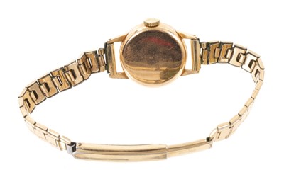 Lot 646 - 1950s ladies Omega with 244 calibre 17 jewel movement, the circular dial with dart hour markers, in an 18ct gold case, 20mm diameter, on later plated bracelet.