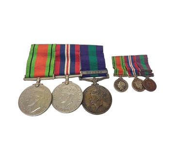 Lot 734 - Second World War and later medal trio comprising Defence, War and George VI General Service medal with Malaya clasp named to Major H. D. Lunt. Kings. (Mounted on bar)