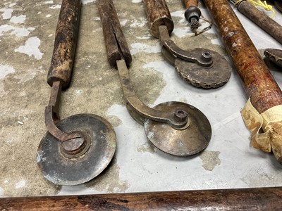 Lot 1532 - Set of 19th century leather working revolving stamps, designed for tooling leather furniture surfaces, approximately 23