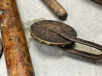 Lot 1532 - Set of 19th century leather working revolving stamps, designed for tooling leather furniture surfaces, approximately 23
