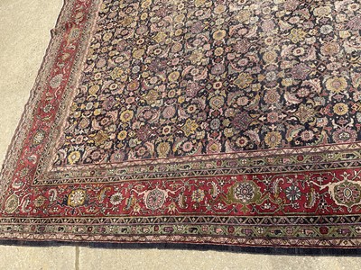 Lot 1576 - Good early Persian Bijar carpet, with allover floral knotwork on midnight blue ground, 400 x 300cm