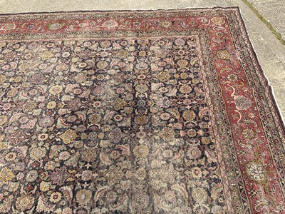 Lot 1576 - Good early Persian Bijar carpet, with allover floral knotwork on midnight blue ground, 400 x 300cm