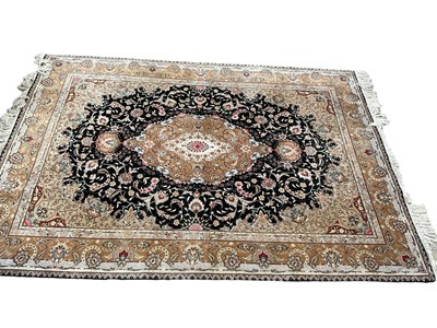 Lot 1295 - Tabriz part silk rug