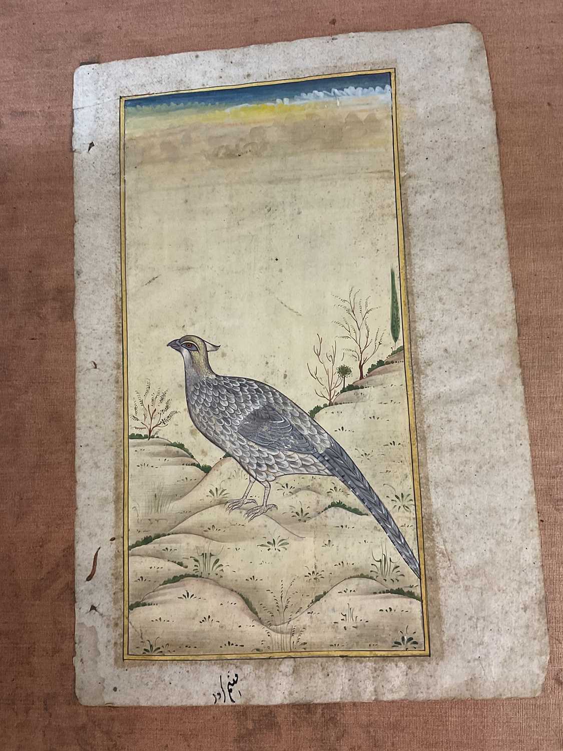 Lot 128 - 19th century Persian illuminated page depicting a silver pheasant