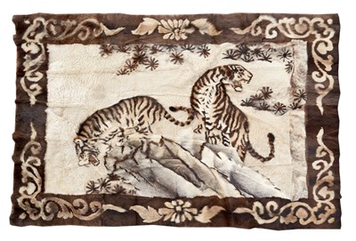 Lot 882 - Impressive hand stitched fur rug depicting a pair of tigers on a rock, 160cm x 220cm