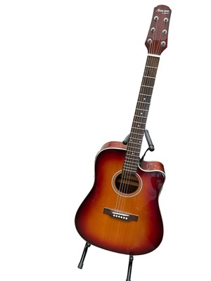 Lot 193 - Guitar and stand and amp
