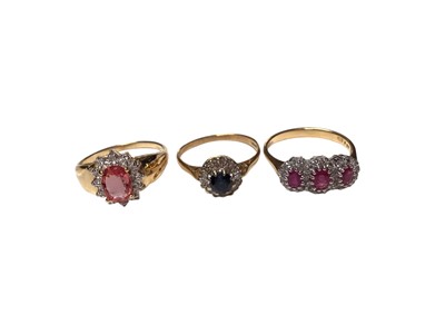 Lot 18 - Three 18ct gold diamond and gem set cluster rings