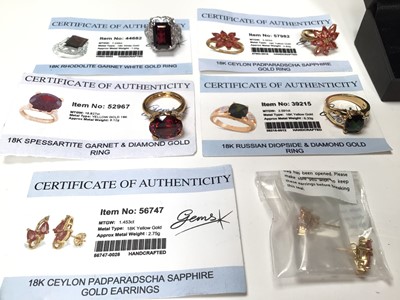 Lot 31 - Five 18ct gold gem set rings and a pair of 18ct gold gem set earrings, mostly with Gems TV certificates