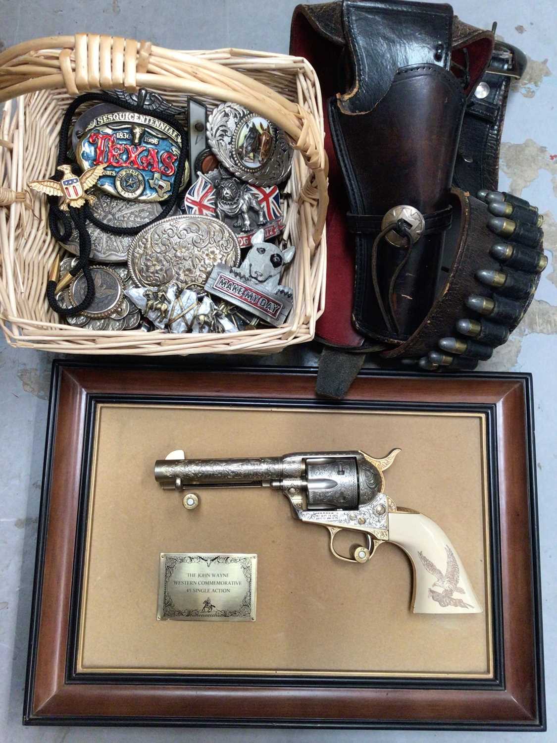 Lot 553 - John Wayne replica gun, leather holster, various belt buckles, penknives, lighters etc