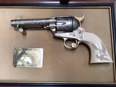 Lot 553 - John Wayne replica gun, leather holster, various belt buckles, penknives, lighters etc