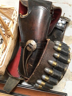 Lot 553 - John Wayne replica gun, leather holster, various belt buckles, penknives, lighters etc