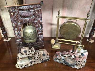 Lot 613 - Two Oriental gongs and two soapstone carvings