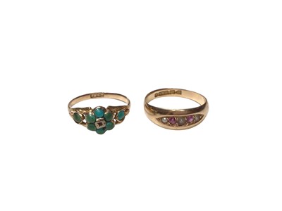 Lot 158 - Two Victorian 15ct gold rings to include a garnet and seed pearl ring (Chester 1886) and a Victorian turquoise cluster forget-me-not ring (2)