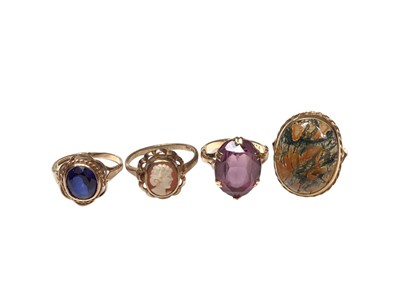 Lot 51 - 9ct gold oval moss agate ring, 9ct gold carved cameo ring and two other 9ct gold gem set rings (4)