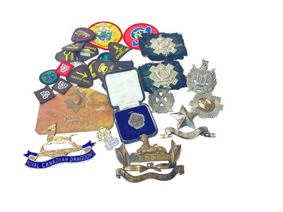 Lot 715 - Collection of military cap badges including Royal Scots and Scottish Horse together with other badges and related items.