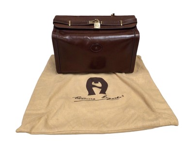 Lot 2050 - Vintage Etienne Aigner dark brown leather Gladstone bag with lock and key plus dust bag.