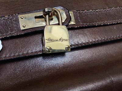 Lot 2050 - Vintage Etienne Aigner dark brown leather Gladstone bag with lock and key plus dust bag.