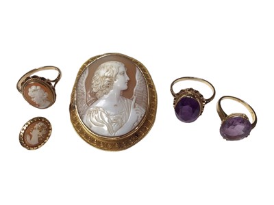 Lot 85 - Two 9ct gold amethyst rings, 9ct gold cameo ring, one cameo earrings and a cameo brooch depicting an angel in a yellow metal mount