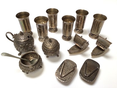 Lot 90 - Set of six silver measures stamped sterling, K. Miyata, pair of silver model boats and pair of silver Japanese sandals, both stamped sterling 950 and an Eastern white metal three piece cruet set
