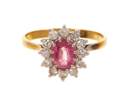 Lot 529 - Ruby and diamond cluster ring