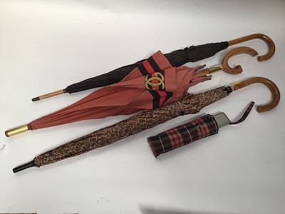 Lot 2055 - Designer umbrellas including vintage Gucci, Giorgio Armani, Le Griffe Ausoni (x2), Pertegaz.  Plus womens blue suede brogues by Todds size 37 1/2 with box and dust bag and spare laces.