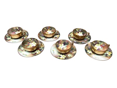 Lot 1148 - Set of six Royal Worcester flower painted cups and saucers, signed by Twin