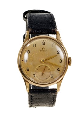 Lot 609 - 1940s gold Omega wristwatch