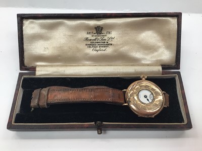 Lot 1036 - Early 20th century 9ct gold half hunter Elgin wristwatch on leather strap in box