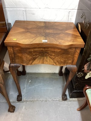 Lot 1200 - Frister & Rossmann sewing machine in a figured walnut veneered table cabinet on cabriole legs together with a matching needlework box with cantilever mechanism and a Singer hand sewing machine (3)