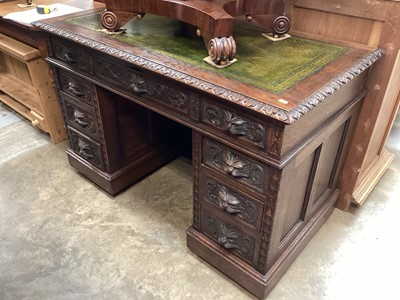 Lot 1260 - Late Victorian carved oak twin pedestal desk