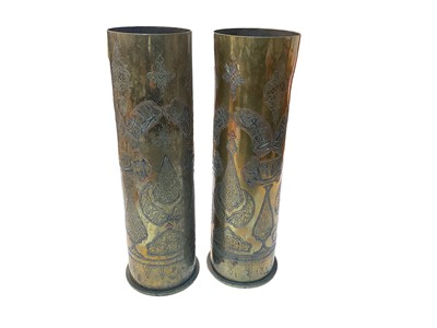 Lot 724 - Pair of First World War brass Trench Art vases with Damascus Islamic silver and copper inlaid decoration, 27.5cm in overall height.