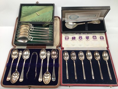 Lot 1025 - Set of six George III silver teaspoons, two other cased sets of six silver teaspoons and a silver millenium spoon (4 cases)